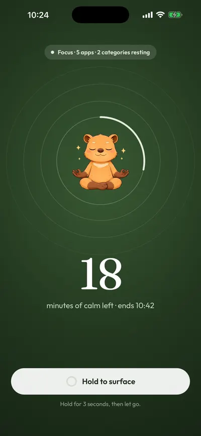 Calma focus session with 18 minutes left and a Hold to surface button that needs a 3-second hold.