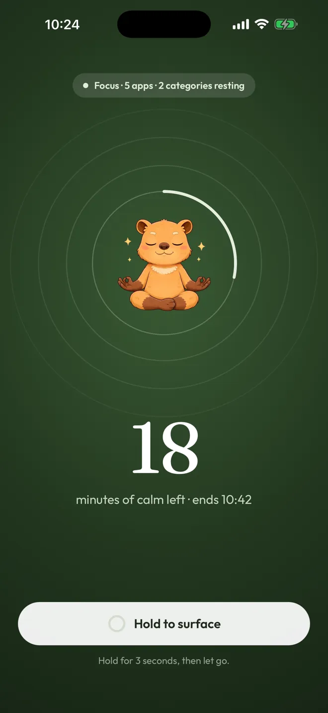Calma focus session: 18 minutes of calm left, with a Hold to surface control.
